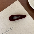 Detailed macro view of dark red velvet BB hair clip with elegant metal inner structure - Teardrop / Burgundy