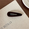 Macro detail of high-quality brown velvet flocking on the stylish metal BB hair clip - Teardrop / Dark Coffee