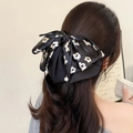 Eleganter schwarzer Blumen-Haarclip mit Schleife, Perlenanhängern und Satin-Finish - Band Floraler Stil Mit Perle