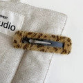 Close-up detail of leopard print plush hair clip with soft faux fur and black metal BB base - Light Leopard - Rectangle