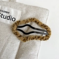 Detailed close-up of a plush leopard print BB hair clip on a natural linen background - Light Leopard - Cloud