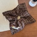 Close-up of brown plaid scrunchie with a gold bear pendant and elegant pearl detail - Coffee Plaid Scarf Style Scrunchie