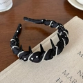 Detail of handmade black satin pleated headband with white pearls and shark fin accents - Solid Color Pleated Pearl Style / Black