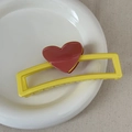 Vibrant yellow rectangular hair claw clip with a contrast dark brown heart accent - Heart-shaped Color-blocked Rectangle - Yellow
