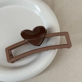 Dark brown heart hair claw clip with rectangular frame on a white ceramic plate - Heart-shaped Color-blocked Rectangle - Brown