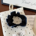 Elegante elastico per capelli nero stile denim con bordi blu su sacchetto - Modello Classico Tagliacuci