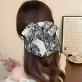 Elegant Chinese ink print bow hair claw clip with white pearls on a long ponytail - Black Printed