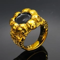 Anillo de calavera punk para hombre en acero inoxidable dorado con gema negra ovalada - US 7 / Dorado