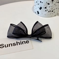 Eleganter Haarclip mit schwarzer Tüllschleife für Damen in minimalistischem Design - Schwarz