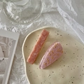 Detail of pink marble resin hair clip and gold leaf glitter hairpin in a ceramic tray - Pink Series