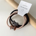 Set di tre elastici per capelli leopardati con fiocco in resina su carta bianca - Stile Fiocco