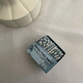 Gray-blue and beige braided elastic hair ties in a minimalist marble gift box - Aqua Blue Twist