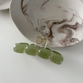 Detailed view of square green translucent resin hair claw clip with jade texture - Fruit Green Hair Claw / Fruit Green