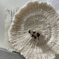 Artistic close-up of a tortoiseshell acetate hair claw clip on a white coral display - Light Tortoiseshell
