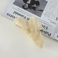 Close-up of pearlized beige butterfly hair claw with Handmade France engraving on inner side - White Ripple