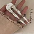 U-shaped hair pin with vintage marble texture made of premium acetate for hair styling - Marble Cream White (5030364754407) / White