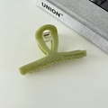 Détail de la pince à cheveux en acétate vert avec lettrage fait main et ressort solide - Vert