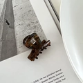 Classic dark tortoise shell pattern hair claw clip with silver spring on book - Blue Coffee