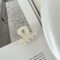 Elegant cream white acetate hair claw clip with pearl-like finish and ribbon design - White