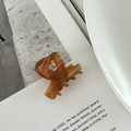 Elegant tortoise shell patterned cellulose acetate hair claw clip with glossy brown finish - Brown