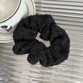 Detailed macro view of black fuzzy scrunchie with sparkling silver metallic thread texture - Scrunchie / Black