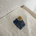 Detailed view of five navy blue drop-shaped metal BB hair clips in craft packaging - Navy Blue