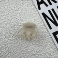 Detailed close-up of cream-white acetate hair claw with gold FRANCE Handmade lettering - Mermaid White
