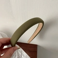 Detailed view of the dark olive green padded sponge headband with matte fabric texture - Grass Green Style