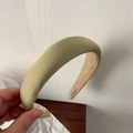 Detail of light green thick sponge headband with premium satin texture and padded design - Green Yellow Style