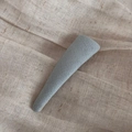 Macro shot of light blue plaid fabric BB clip with detailed textile texture on beige linen - Triangle Snap Clip - Blue