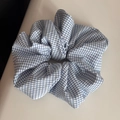 Close-up of a large blue and white gingham fabric scrunchie with soft ruffled texture - Blue White Fine Plaid Large Scrunchie