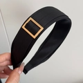Retro zwarte brede haarband met stoftextuur en gouden metalen gesp voor dames - Zwart