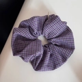 Detailed view of large purple and black checkered fabric scrunchie with soft cotton texture - Dark Purple Plaid Scrunchie
