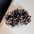 Detail of elegant leopard print fabric floral hair claw clip with multiple petal layers - Leopard Print Triple Flower Claw Clip