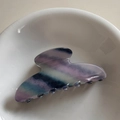 Detail shot of large marbled purple claw clip with glossy finish in a white ceramic bowl - Blue Purple Twill-Large Fan