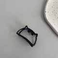 Macro shot of a minimalist black geometric hair claw clip with cat ear shape on grey surface - Cat Shape (4.5cm) / Black
