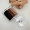 Set of 10 earth-tone gradient elastic hair bands in a clear acrylic box packaging - Thick Style