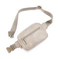 Beige PU leather belt bag with adjustable nylon strap and dual zipper pockets for travel - Off White