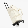 Bolso de viaje multifuncional con cremallera roja y carrito plegable sobre blanco - 36-55L / Beige Con Carrito