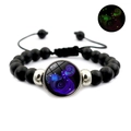 Luminous Aquarius zodiac bracelet with black matte beads and glowing glass pendant - Aquarius