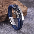 Close-up of multilayer blue leather bracelet featuring silver anchor charm and magnetic clasp - Anchor Blue