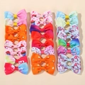 Detail von farbenfrohen Haarschleifen für Kinder mit Regenbogen- und Einhornmustern - Cupcake und Einhorn Stil (032t4-20B)