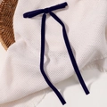 Elegant navy blue velvet bow hair clip with long ribbons on white woven background - Dark Blue