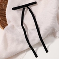 Classic black velvet bow hair clip with long streamers in a minimalist vintage style - Black