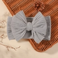Grey elastic baby headband featuring jacquard cable knit texture and large bow detail - Gray