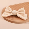 Elegante pinza para el pelo con lazo de satén beige y sujeción metálica - Blanco Roto