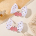 Detailansicht der doppellagigen Kirsch-Haarspangen mit goldenen Punkten und Stickerei - Rosa Kirsche (2A-1)