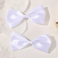 Pair of elegant white satin bow hair clips for girls with a smooth silky ribbon texture - White (2A-18)