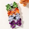 Set of 4 Halloween themed bow hair clips with pumpkin and ghost patterns on card - 4g