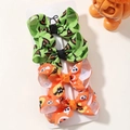 Halloween bow hair clips set featuring vibrant orange and green festive patterns - 4K
